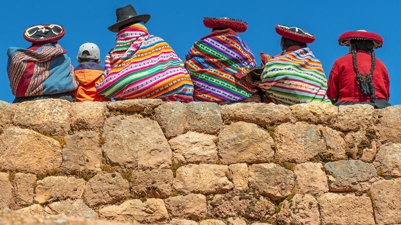 Quechua Indigenous Women on Ancient Inca Wall