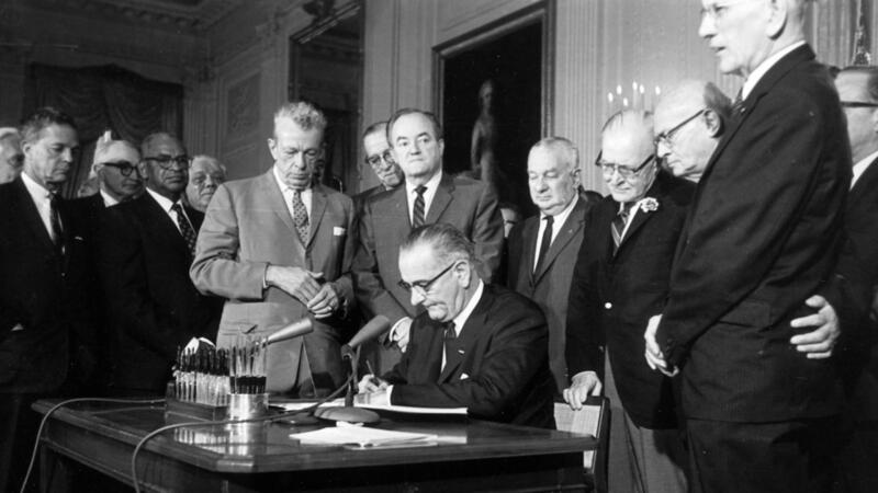 LBJ Signs Civil Rights Act